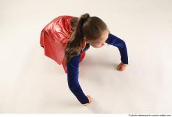 VIKY SUPERGIRL KNEELING POSE 2